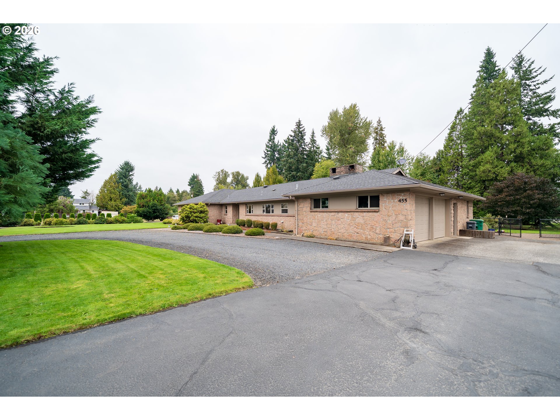 455 West High Street Stayton, OR 97383 - Photo 38 of 48 a view of a house with backyard and garden