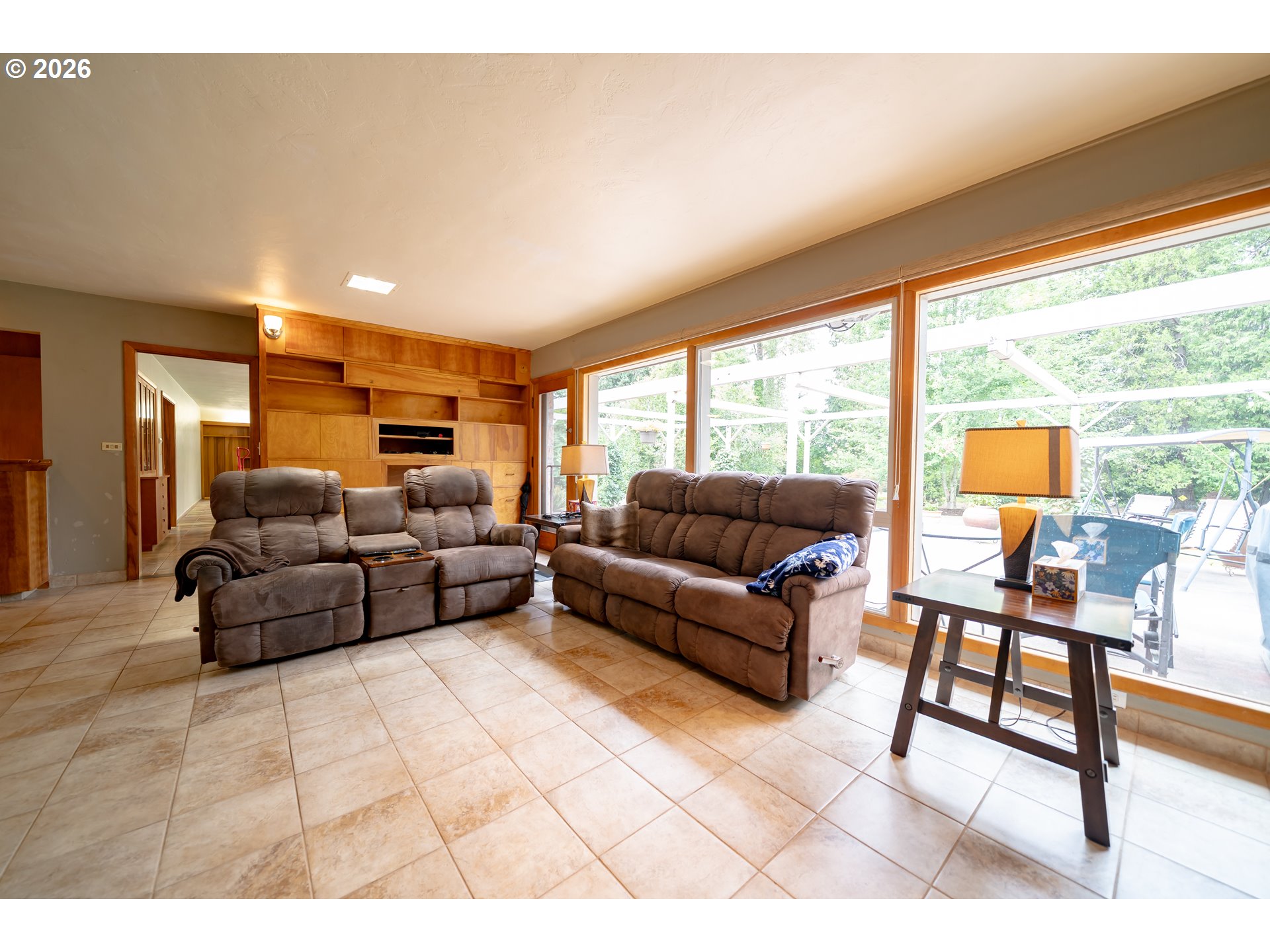 455 West High Street Stayton, OR 97383 - Photo 6 of 48 a living room with furniture and a large window