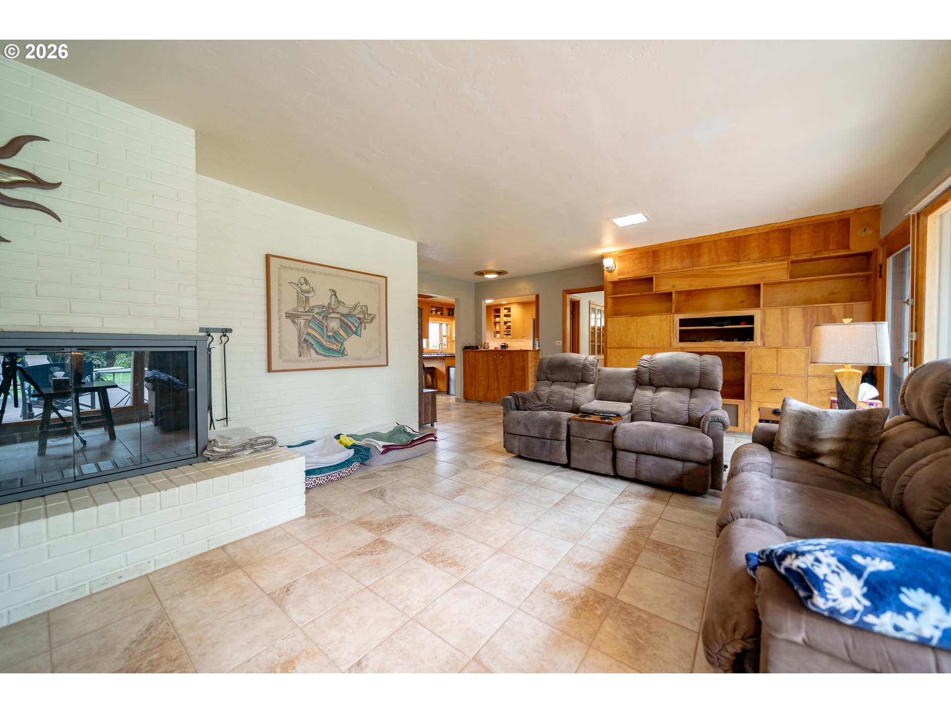 455 West High Street Stayton, OR 97383 - Photo 7 of 48 a living room with furniture and a flat screen tv
