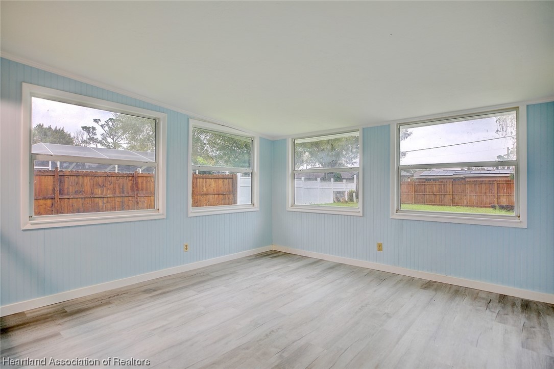 114 Spring Garden Road Sebring, FL 33870 - Photo 11 of 34 a view of an empty room with a window
