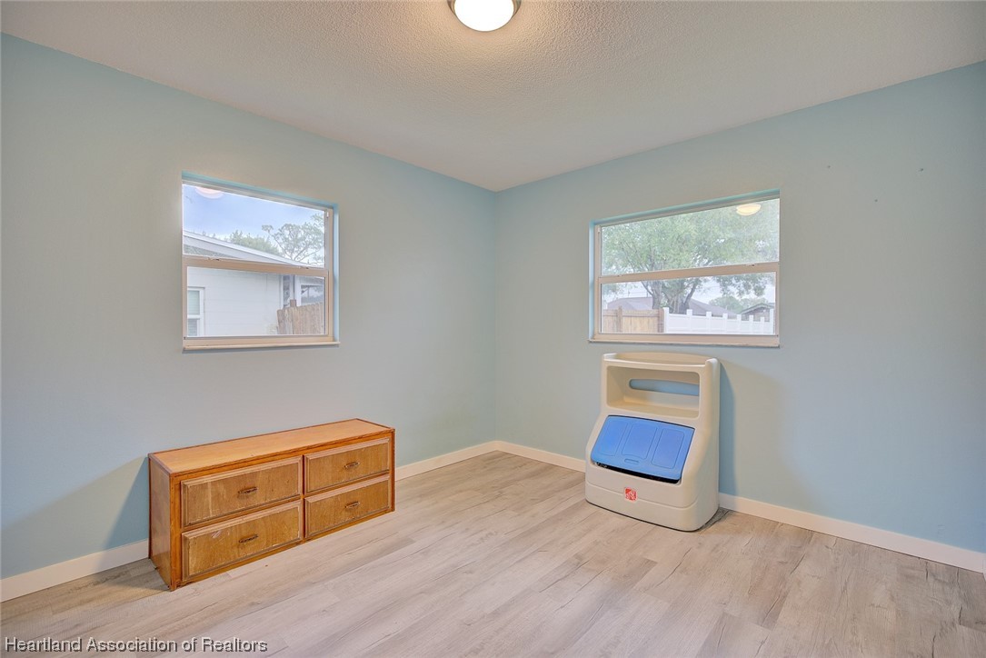 114 Spring Garden Road Sebring, FL 33870 - Photo 14 of 34 a living room with furniture and a window