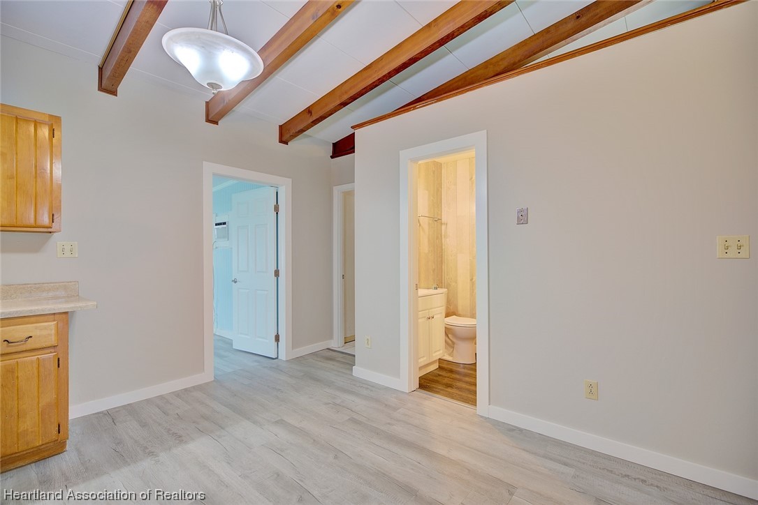 114 Spring Garden Road Sebring, FL 33870 - Photo 23 of 34 a view of empty room with wooden floor