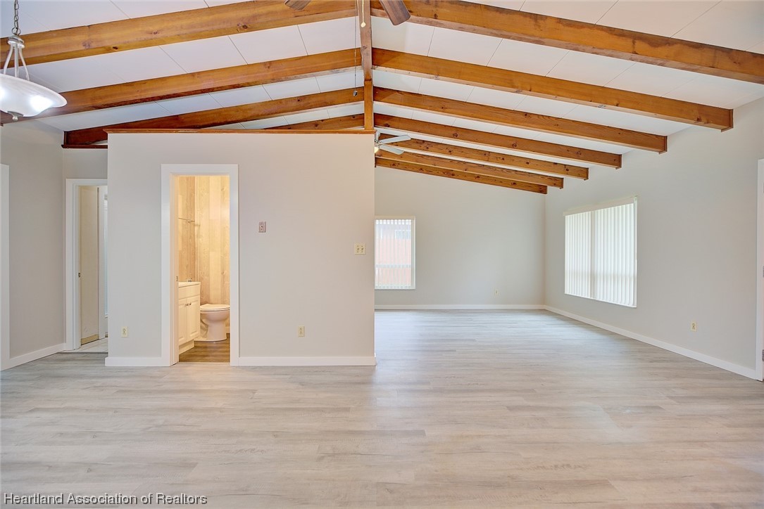 114 Spring Garden Road Sebring, FL 33870 - Photo 8 of 34 a view of a room with wooden floor and windows