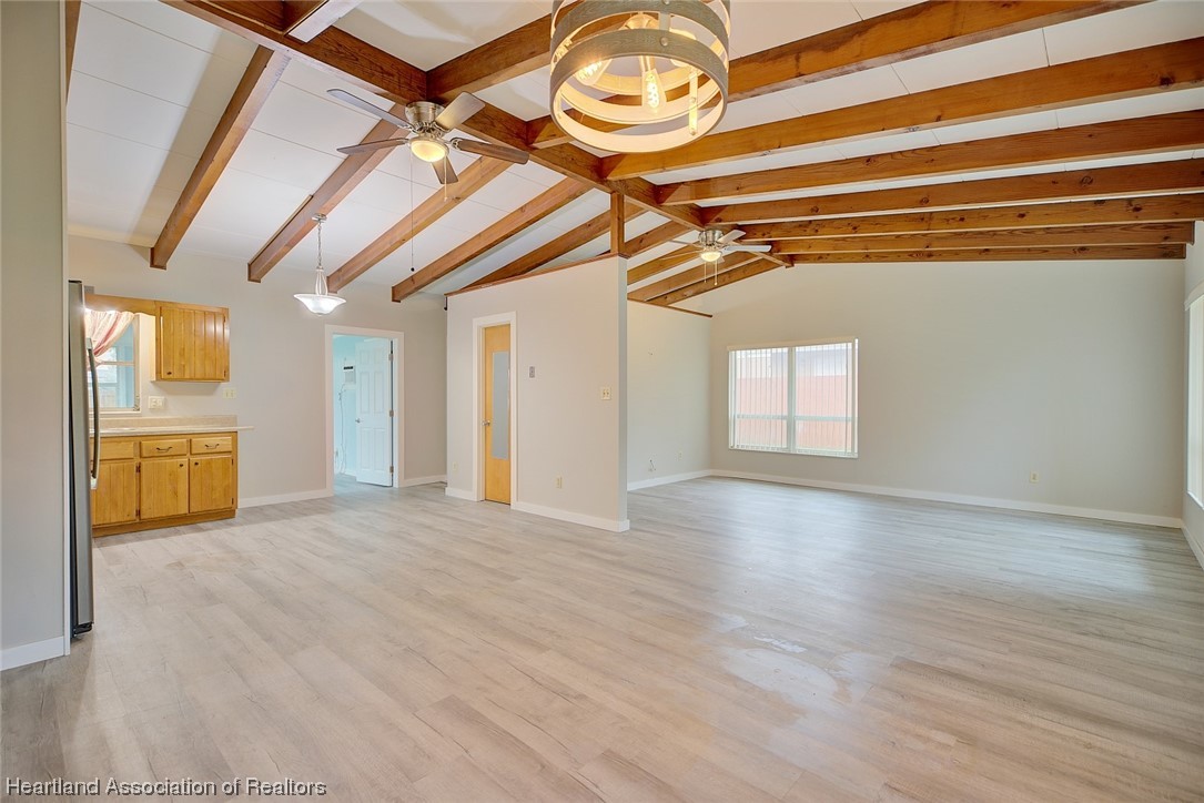 114 Spring Garden Road Sebring, FL 33870 - Photo 10 of 34 a view of a room with wooden floor and windows