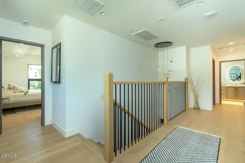 a view of a bedroom from a hallway