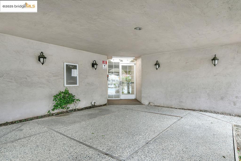 1699 Laguna Street, Unit 311 Concord, CA 94520 - Photo 3 of 29 a view of an empty room with a window