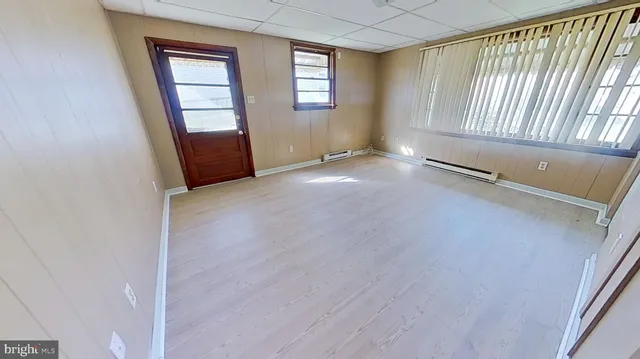 an empty room with windows