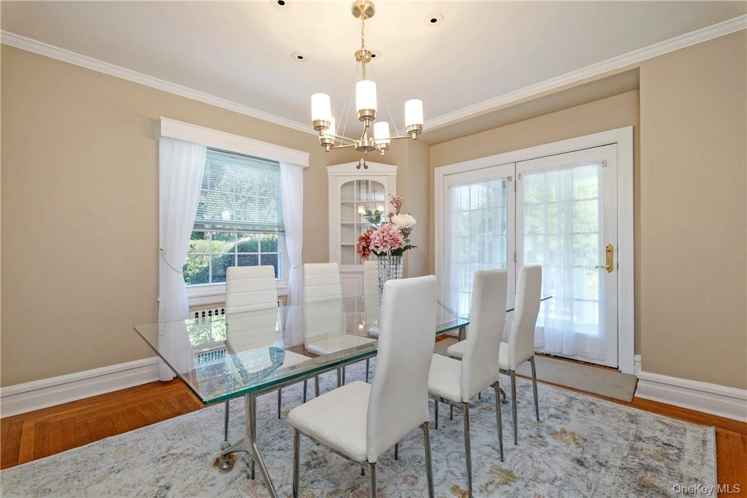 107 Lee Road Scarsdale, NY 10583 - Photo 6 of 31 Dining room with door to side covered porch