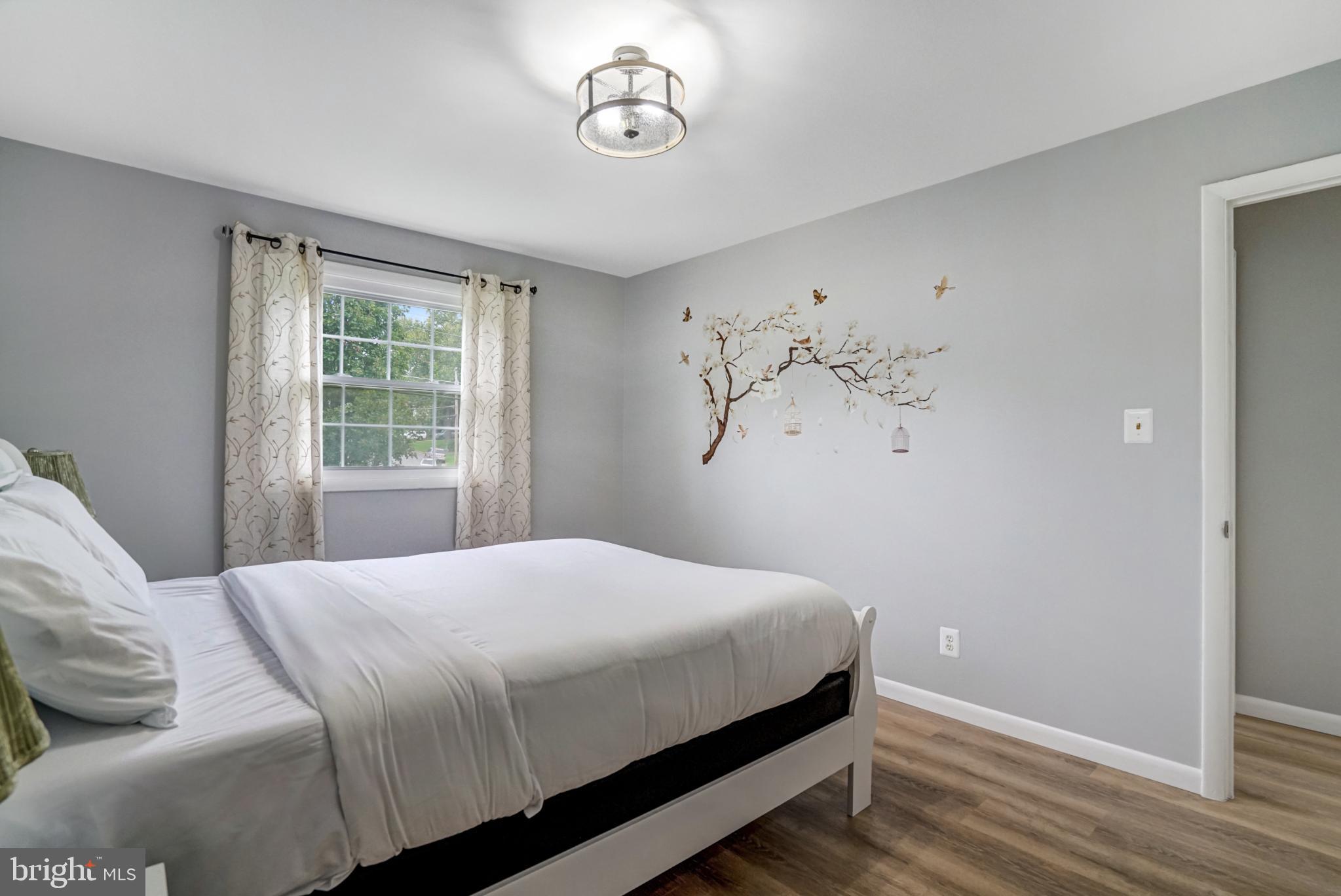 7727 Kalorama Road Annandale, VA 22003 - Photo 18 of 51 Serene bedroom with nature-inspired decor.