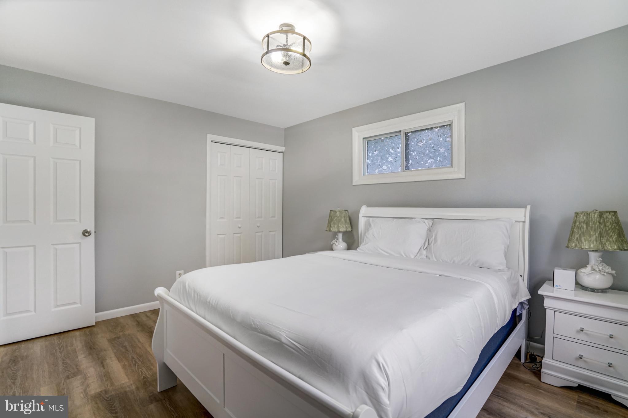 7727 Kalorama Road Annandale, VA 22003 - Photo 19 of 51 Serene bedroom with natural light and charm.