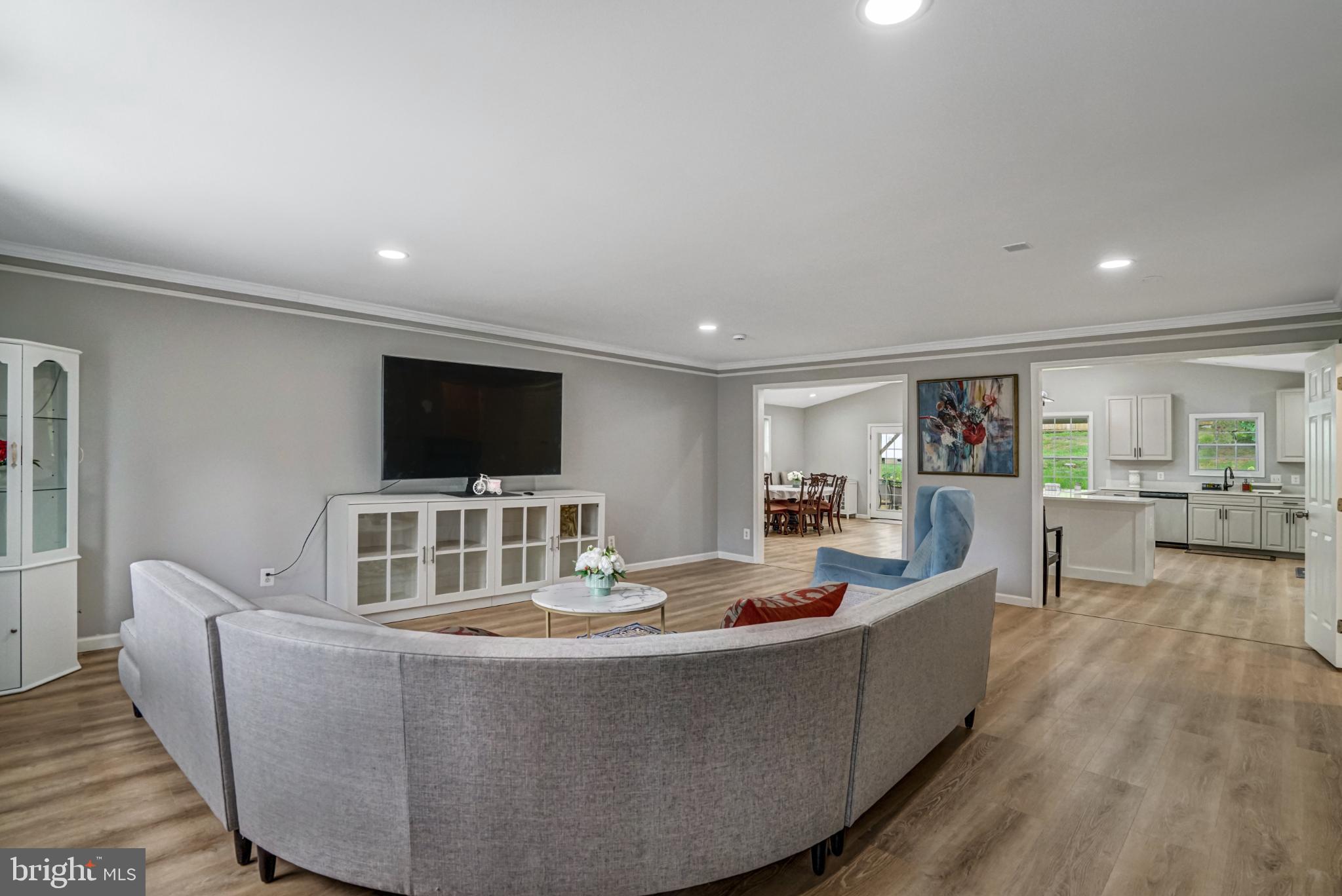 7727 Kalorama Road Annandale, VA 22003 - Photo 21 of 51 Spacious living area with modern elegance.