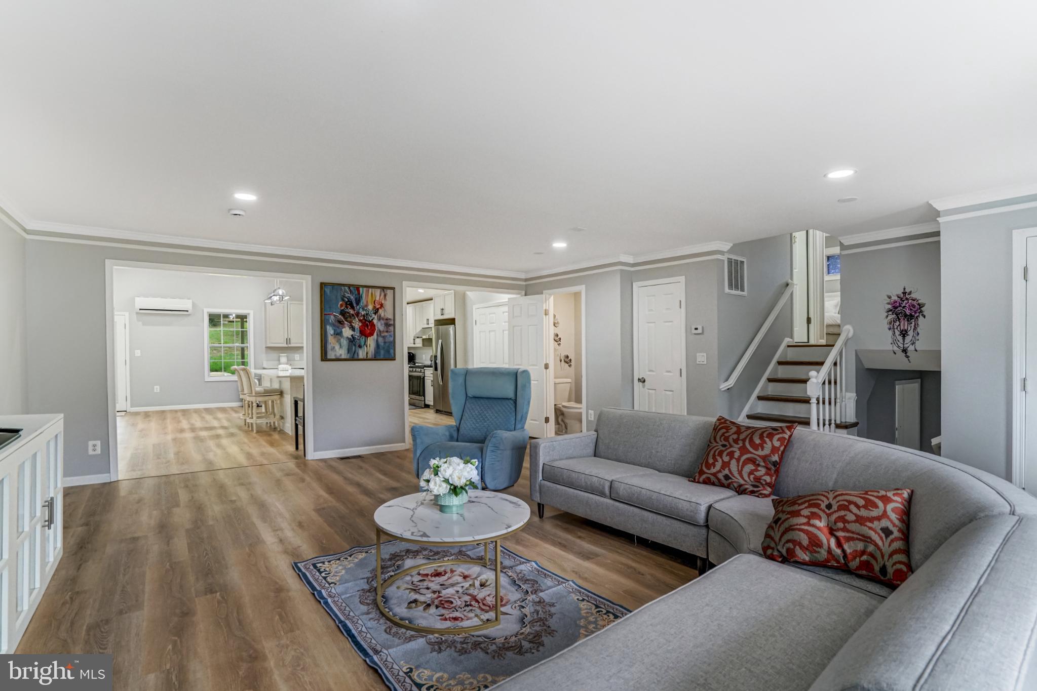 7727 Kalorama Road Annandale, VA 22003 - Photo 22 of 51 Spacious living area with modern elegance.