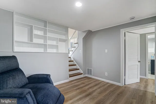 a view of livingroom with furniture and wooden floor