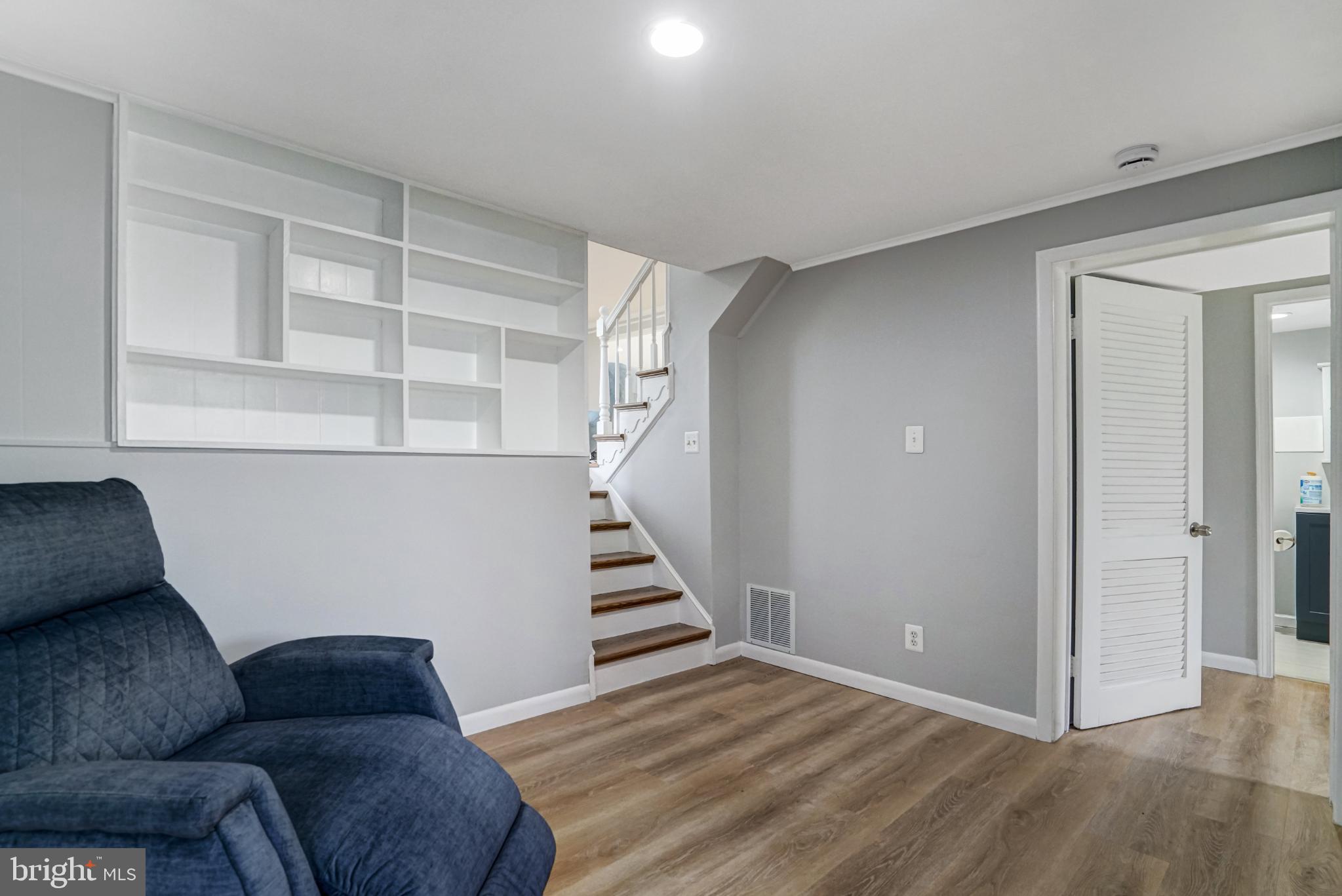 7727 Kalorama Road Annandale, VA 22003 - Photo 39 of 51 Modern living space with stylish staircase.