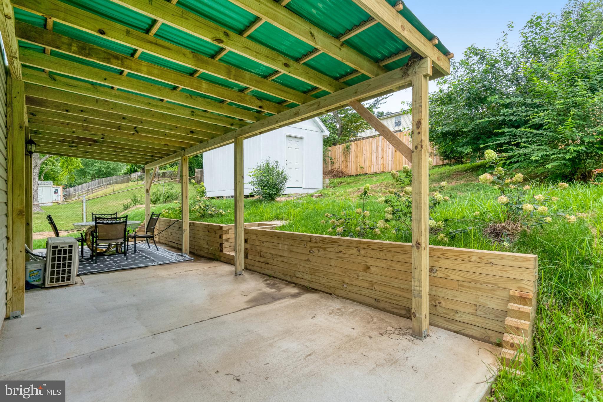 7727 Kalorama Road Annandale, VA 22003 - Photo 8 of 51 Charming outdoor retreat with lush greenery.