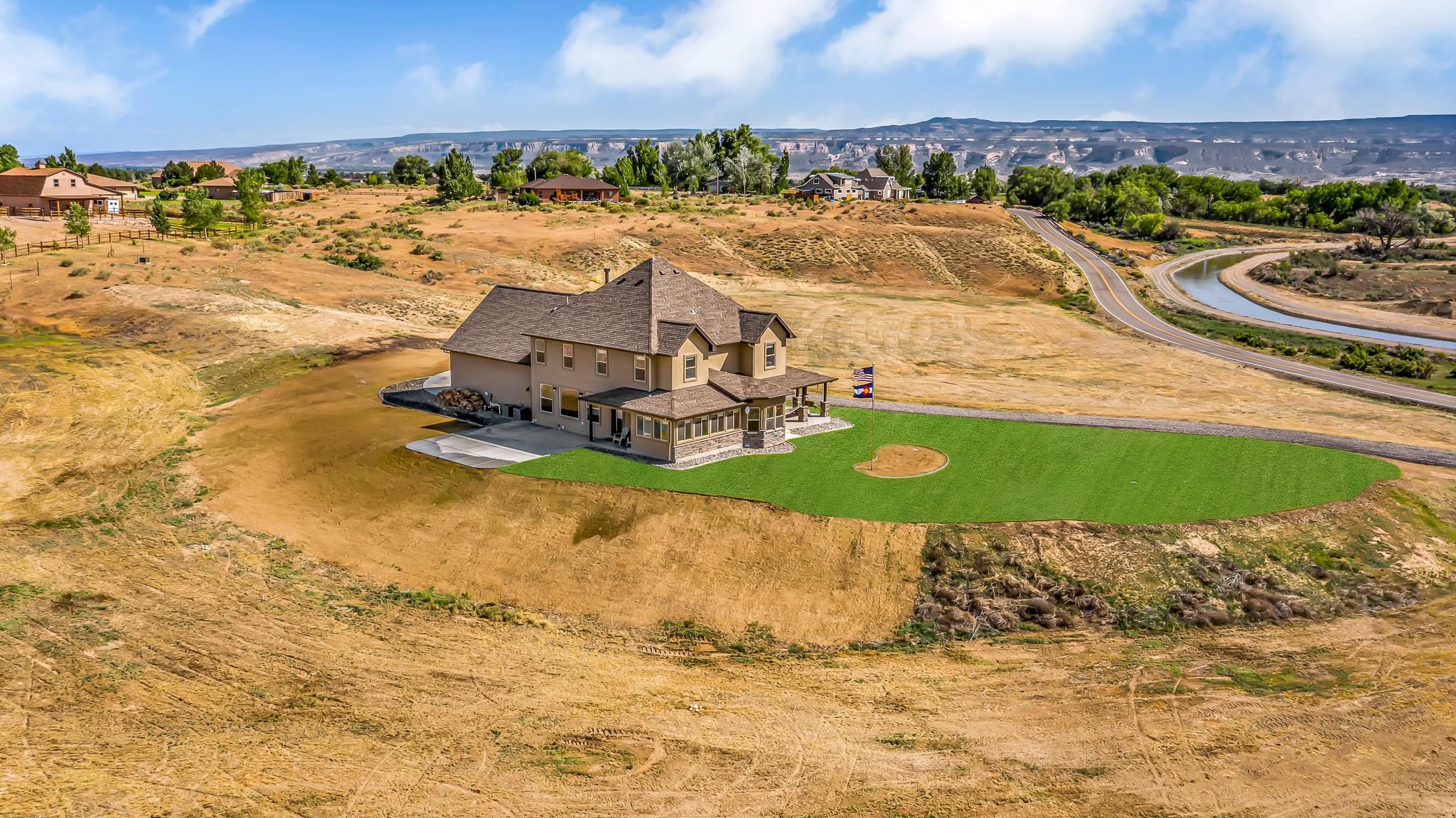 1816 M M 3/4 Road Fruita, CO 81521 - Photo 42 of 42 a view of a swimming pool with a yard