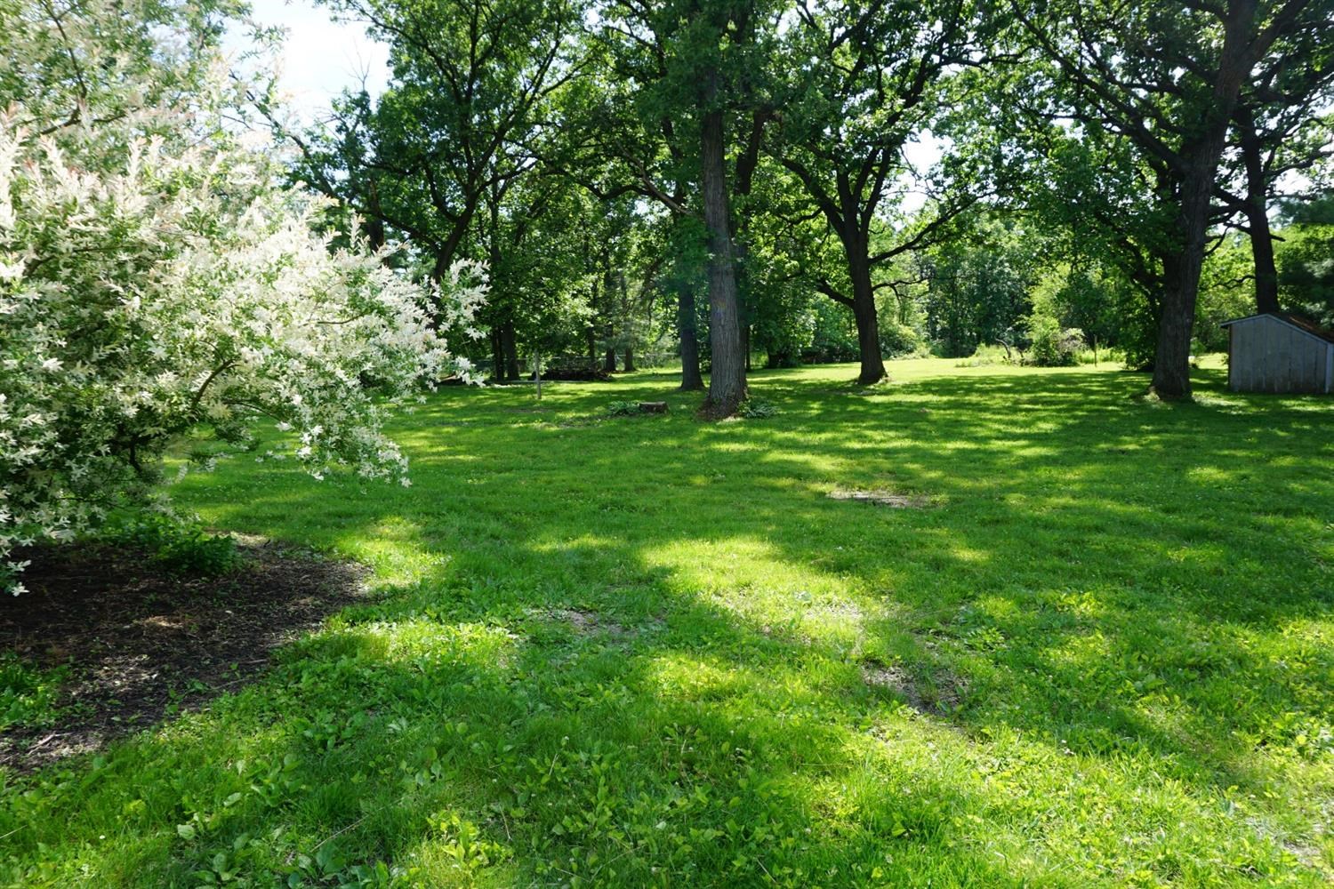 10420 Clark Road Crown Point, IN 46307 - Photo 2 of 9 a view of outdoor space with a garden