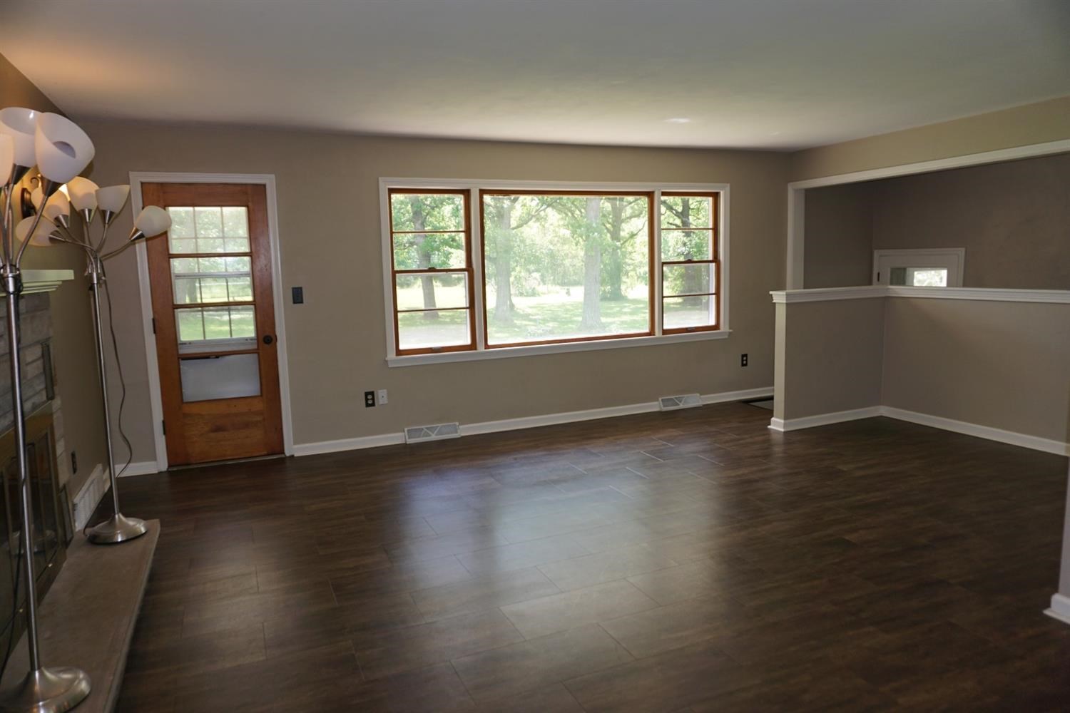 10420 Clark Road Crown Point, IN 46307 - Photo 4 of 9 an empty room with wooden floor and windows