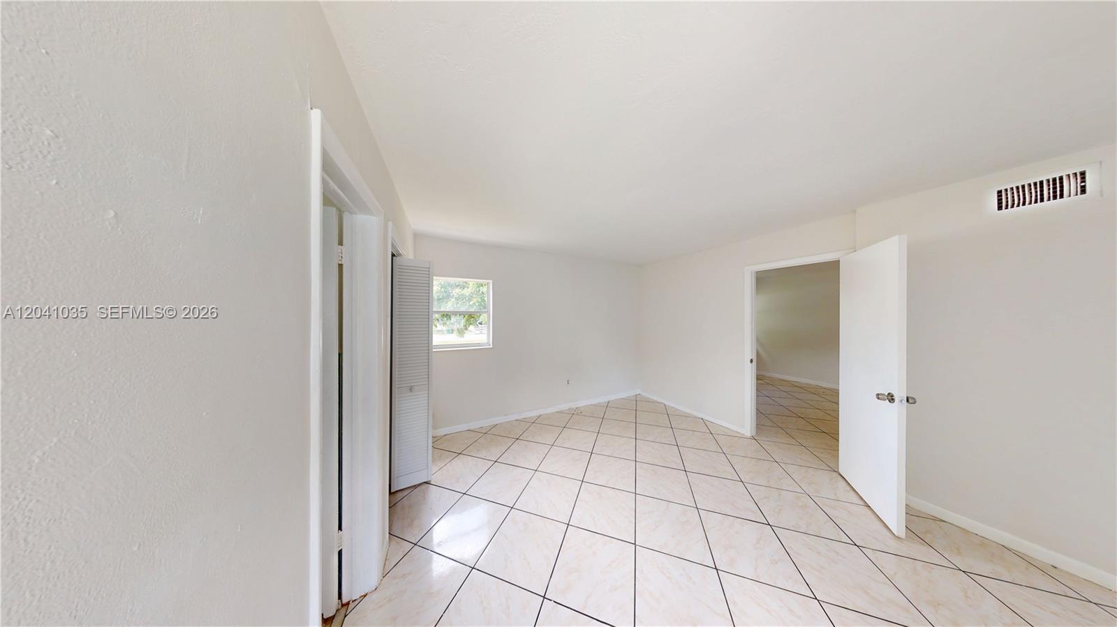6811 Southwest 16th Street Miami, FL 33144 - Photo 5 of 21 a view of an empty room