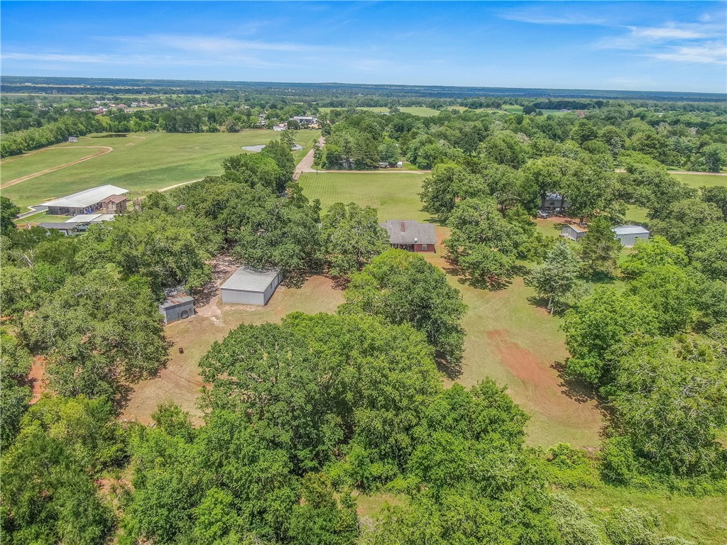 1110 County Road 439 Dime Box, TX 77853 - Photo 49 of 50 a view of a lake with a yard