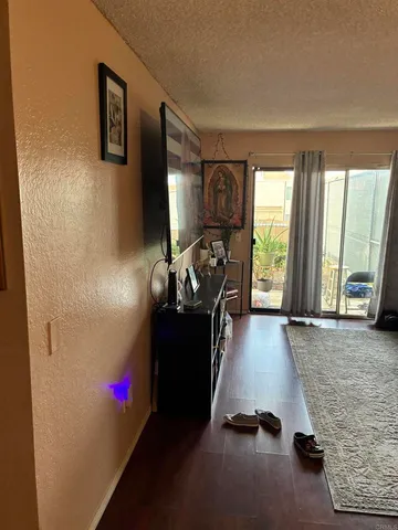 a room with a window and gym equipment