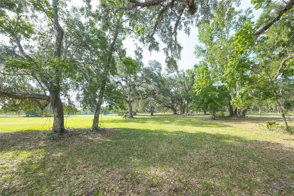 a view of an outdoor space and a yard