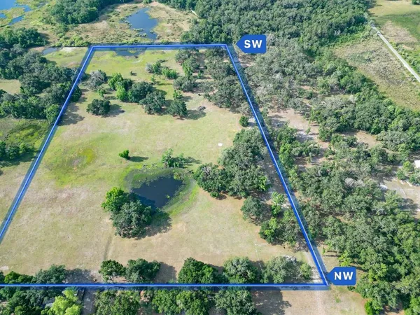 a view of swimming pool from a balcony