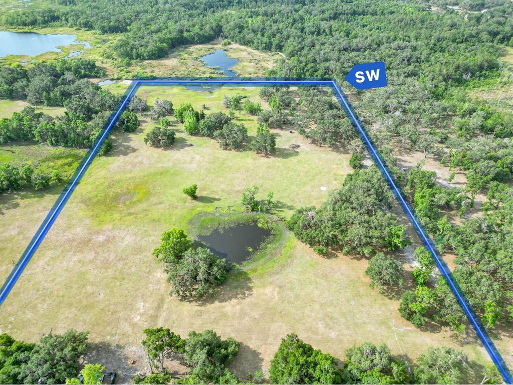 772b Webster Webster, FL 33597 - Photo 10 of 44 a view of a garden with a lake view