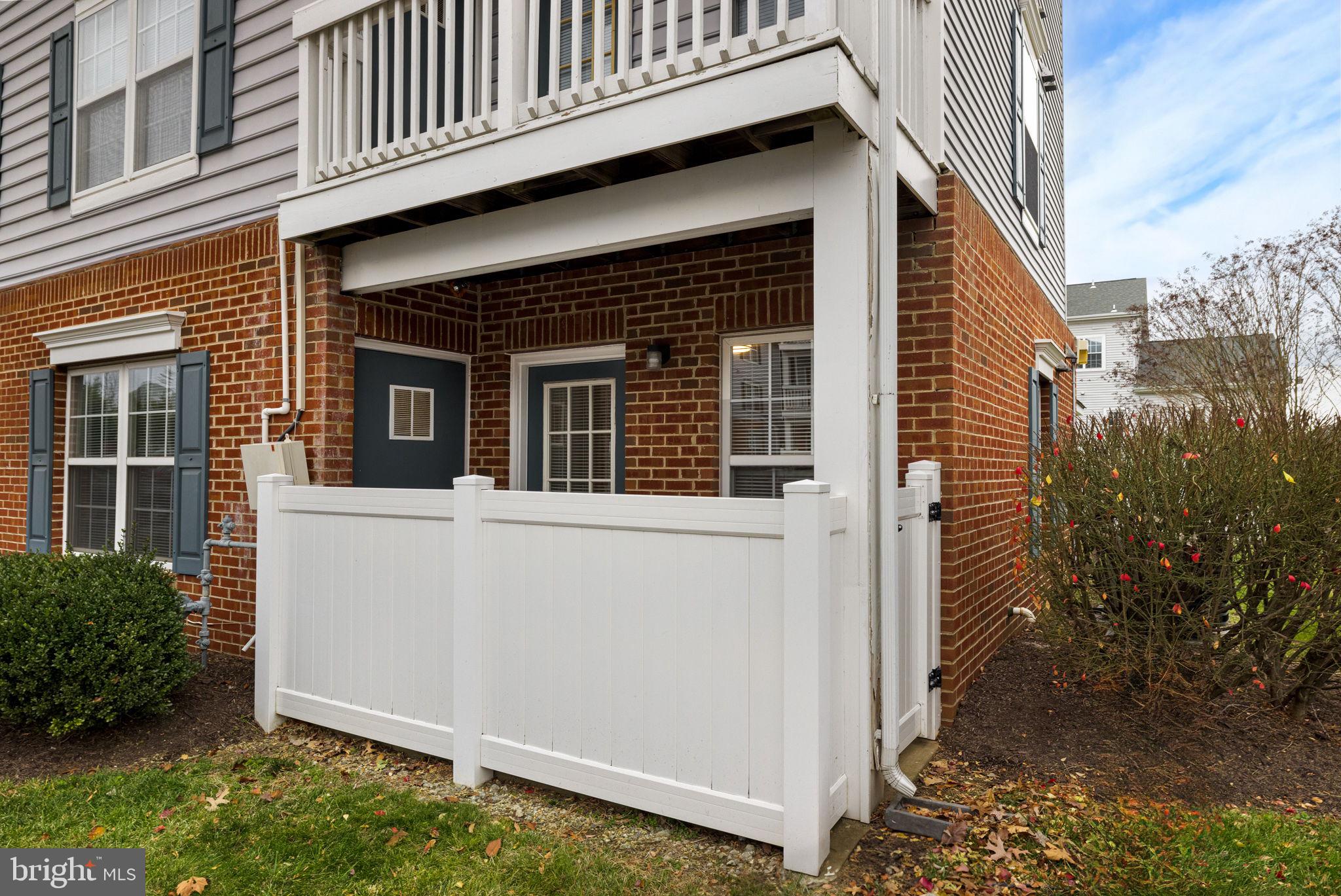 645 Constellation Square Southeast, Unit B Leesburg, VA 20175 - Photo 2 of 17 a view of a house with a yard