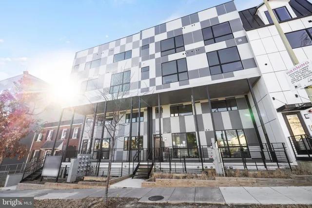 a view of a balcony with wooden floor