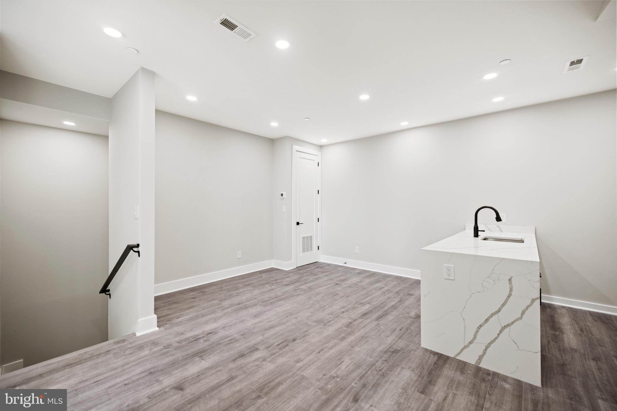 824 18th Street Northeast, Unit 304 Washington, DC 20002 - Photo 13 of 25 a view of empty room with wooden floor