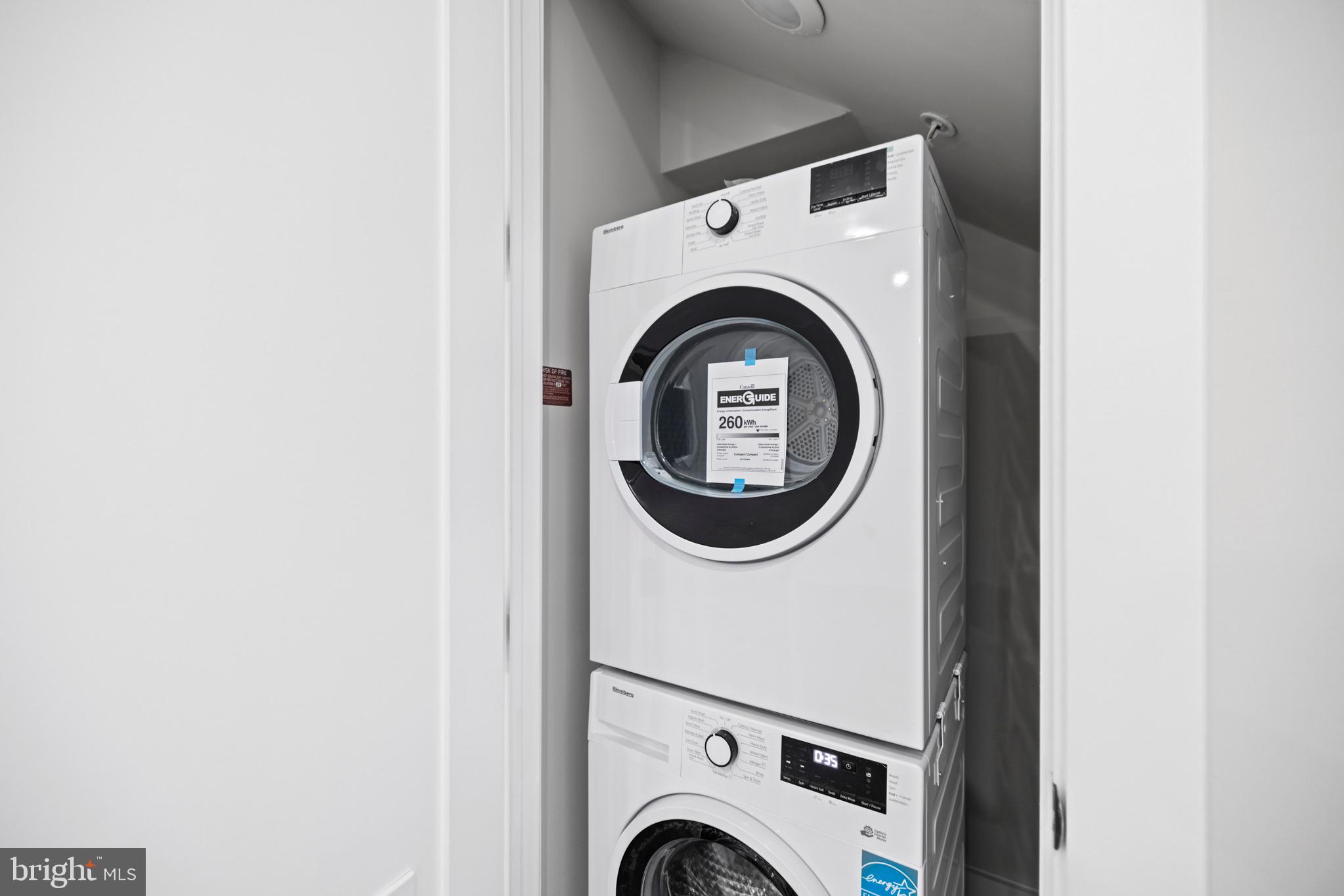 824 18th Street Northeast, Unit 304 Washington, DC 20002 - Photo 14 of 25 a utility room with dryer and washer