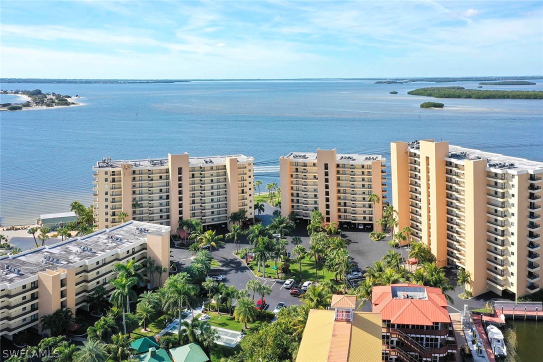 15011 Punta Rassa Road, Unit 204 Fort Myers, FL 33908 - Photo 1 of 23 a view of a city with tall buildings