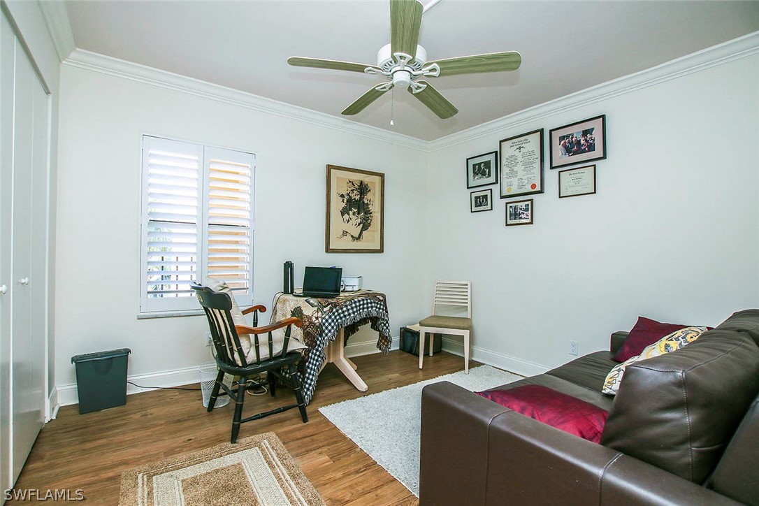 15011 Punta Rassa Road, Unit 204 Fort Myers, FL 33908 - Photo 17 of 23 a living room with furniture and a window