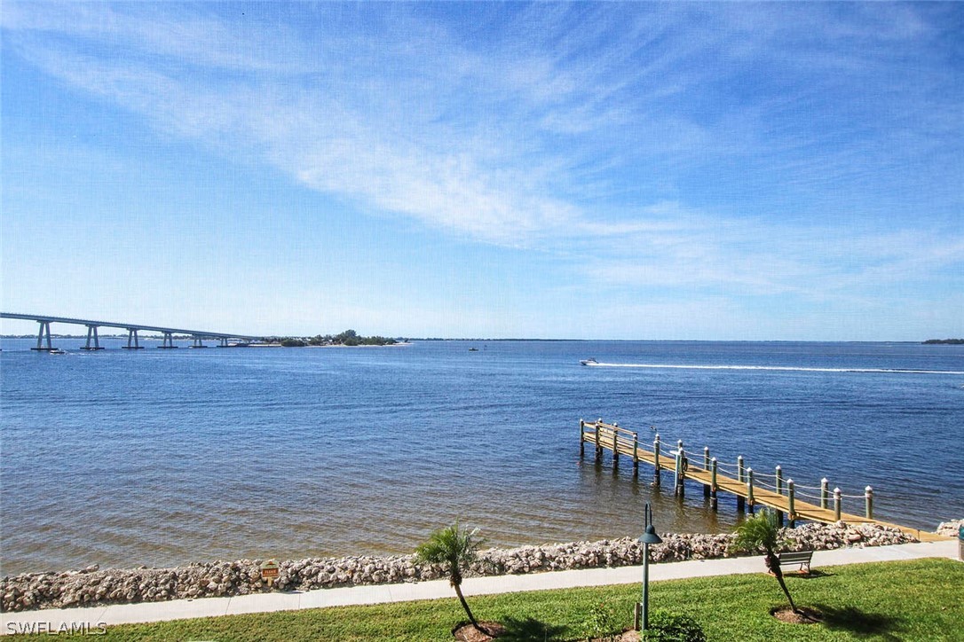 15011 Punta Rassa Road, Unit 204 Fort Myers, FL 33908 - Photo 20 of 23 a view of swimming pool with an ocean view