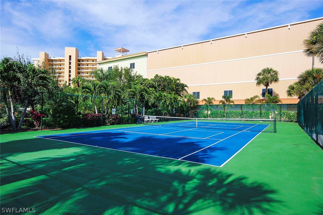 15011 Punta Rassa Road, Unit 204 Fort Myers, FL 33908 - Photo 21 of 23 a view of a tennis court
