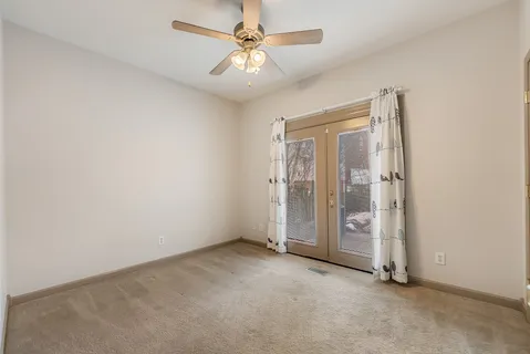 an empty room with a bathroom