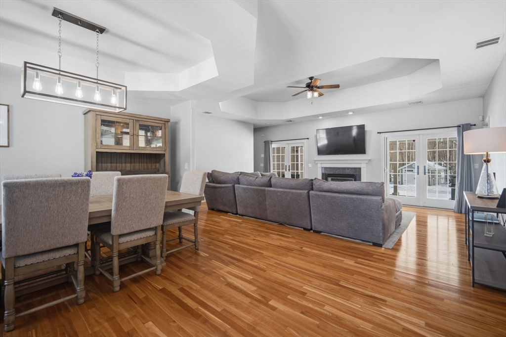 56 Old Lyman Road South Hadley, MA 01075 - Photo 11 of 40 a living room with furniture wooden floor and a flat screen tv