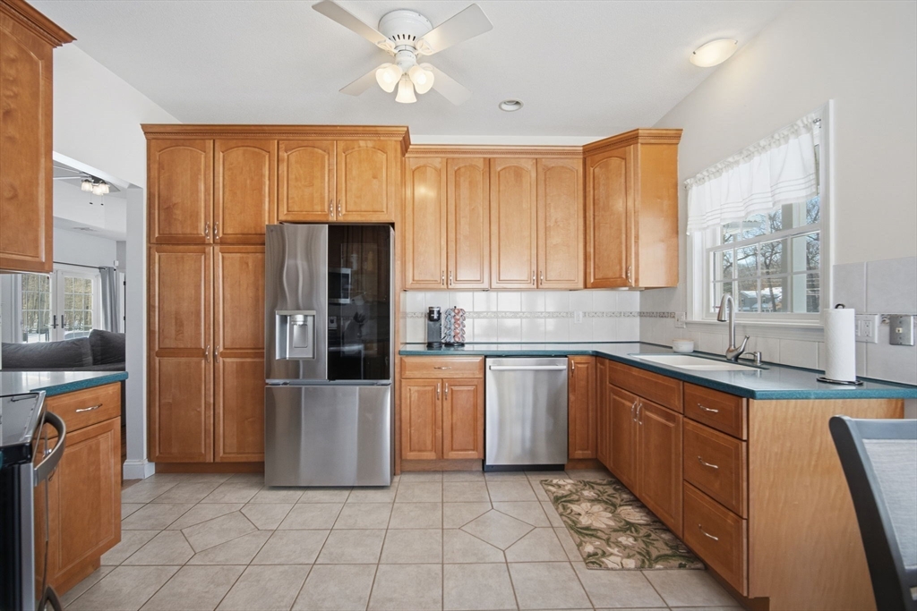 56 Old Lyman Road South Hadley, MA 01075 - Photo 14 of 40 a kitchen with stainless steel appliances granite countertop a refrigerator and a sink
