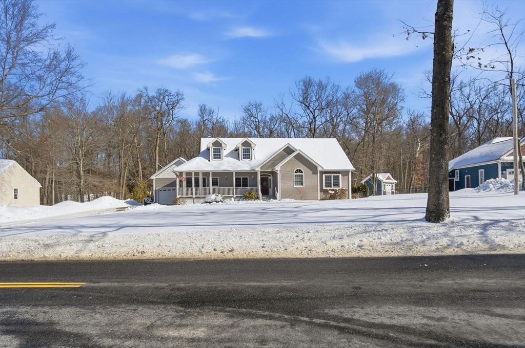 56 Old Lyman Road South Hadley, MA 01075 - Photo 2 of 40 a view of a house with a yard in front of it