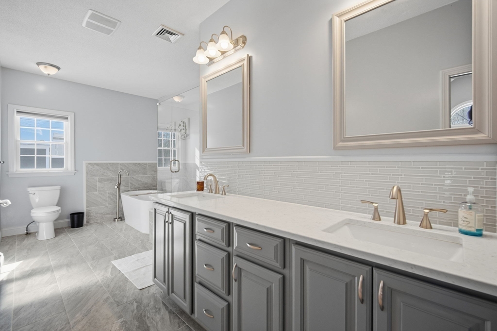 56 Old Lyman Road South Hadley, MA 01075 - Photo 22 of 40 a kitchen with a sink cabinets and window