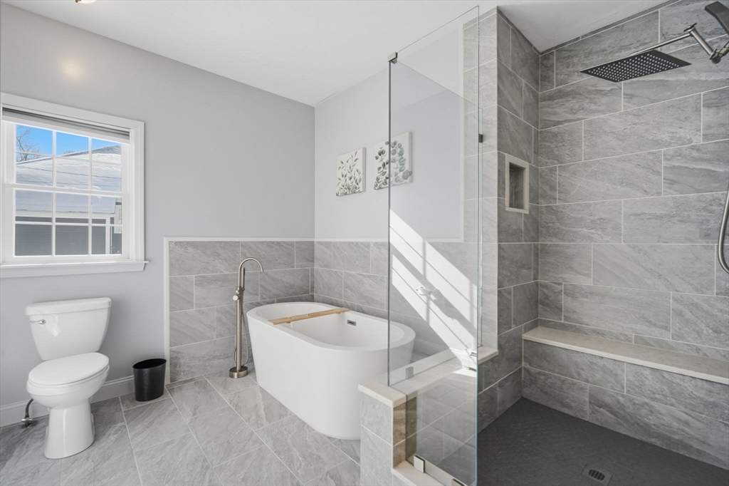 56 Old Lyman Road South Hadley, MA 01075 - Photo 24 of 40 a bathroom with a bathtub and a toilet