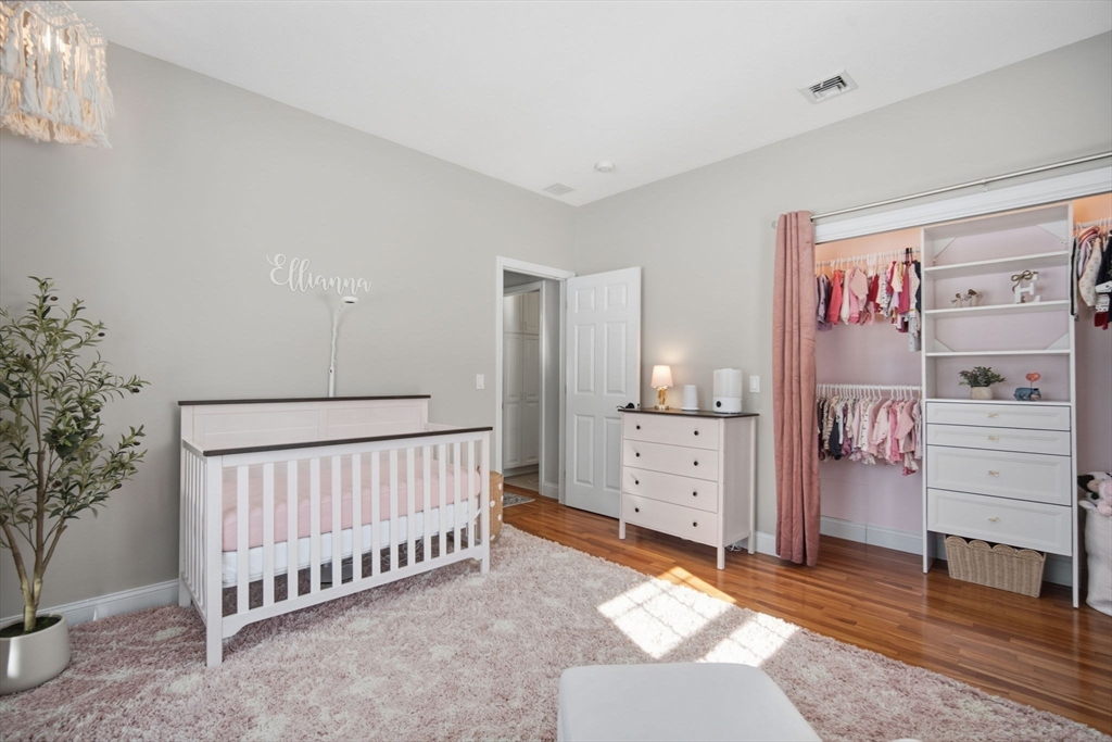 56 Old Lyman Road South Hadley, MA 01075 - Photo 27 of 40 a spacious bedroom with a bed and a window