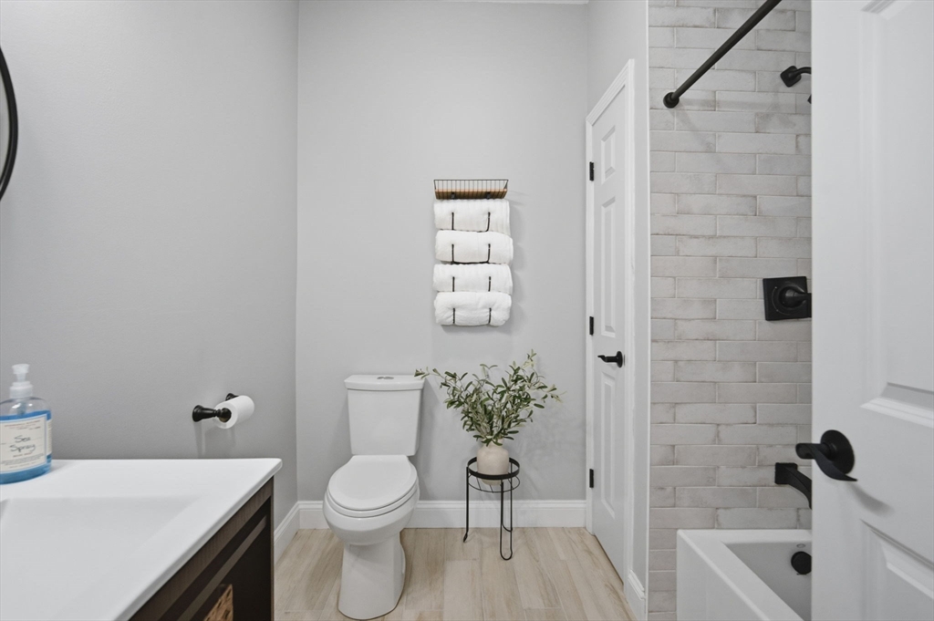 56 Old Lyman Road South Hadley, MA 01075 - Photo 29 of 40 a white toilet sitting next to a bath tub