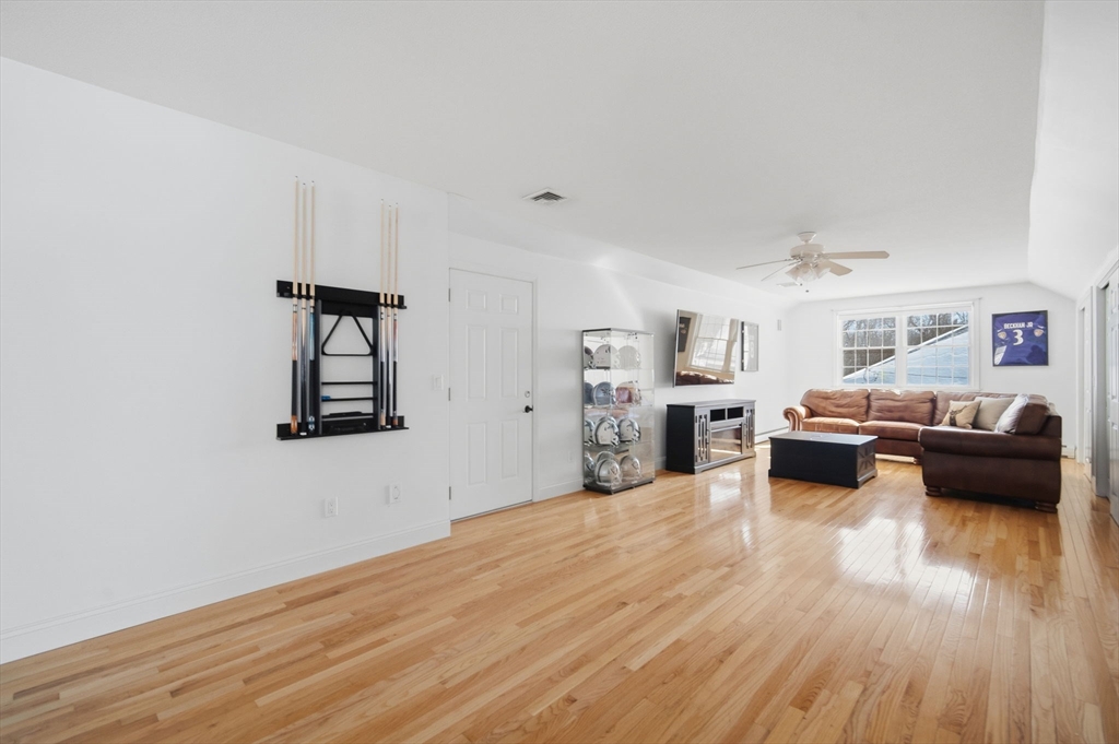 56 Old Lyman Road South Hadley, MA 01075 - Photo 33 of 40 a living room with furniture and wooden floor