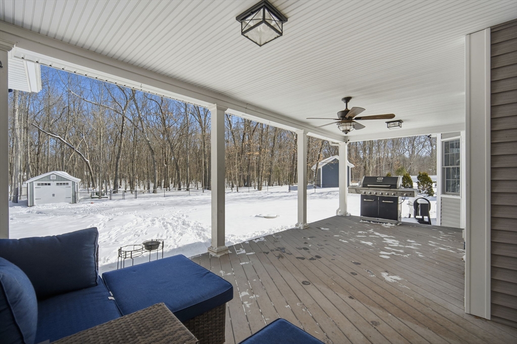 56 Old Lyman Road South Hadley, MA 01075 - Photo 39 of 40 a living room with furniture and a floor to ceiling window