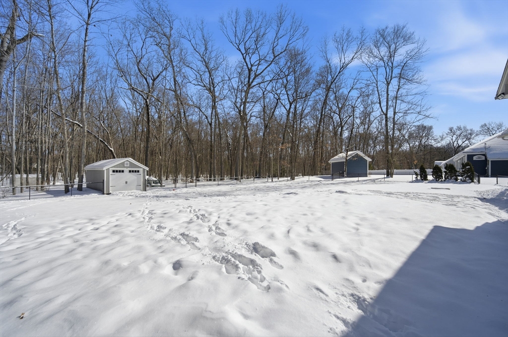 56 Old Lyman Road South Hadley, MA 01075 - Photo 40 of 40 a view of a snow with snow on the road