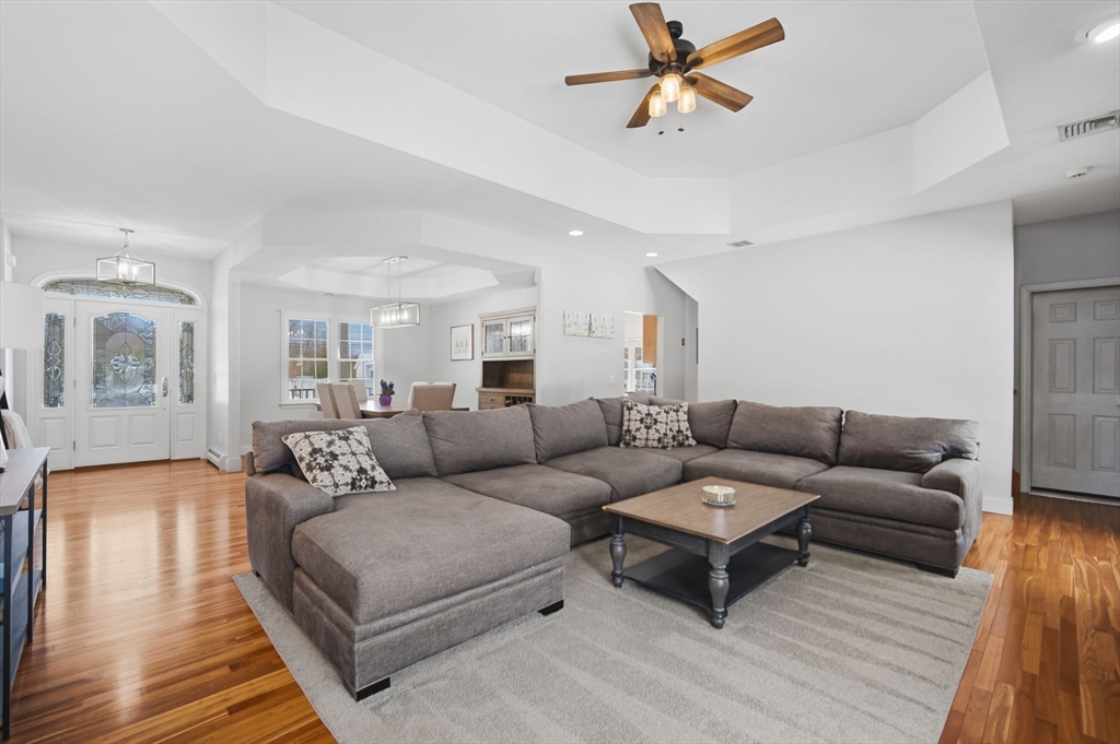 56 Old Lyman Road South Hadley, MA 01075 - Photo 5 of 40 a living room with furniture a ceiling fan and a rug