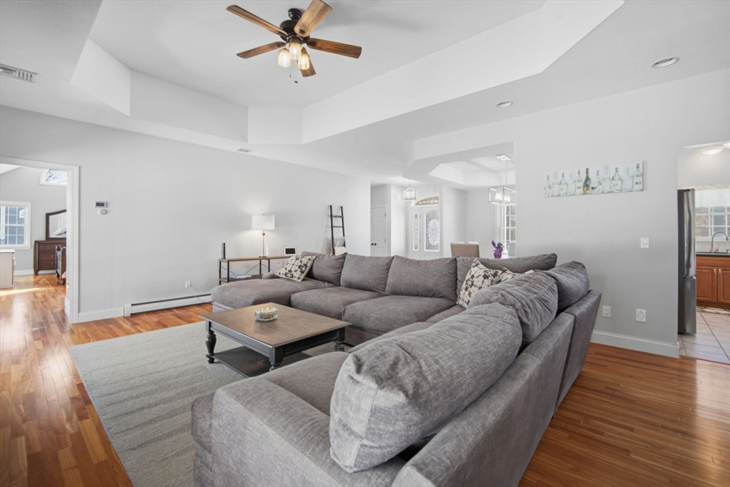 56 Old Lyman Road South Hadley, MA 01075 - Photo 7 of 40 a living room with furniture and wooden floor