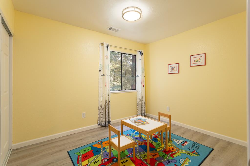 93 Shaniko Common, Unit 24 Fremont, CA 94539 - Photo 16 of 25 a room with furniture and rug
